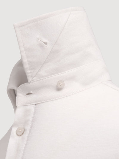 Madeira French Linen Long Sleeve Polo in *White Lotus* (off-white) — collar button system detail | Y.Chroma